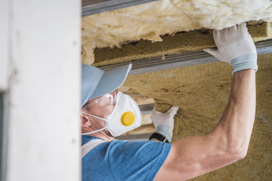 man installing insulation fort collins CO man installing insulation fort collins CO
